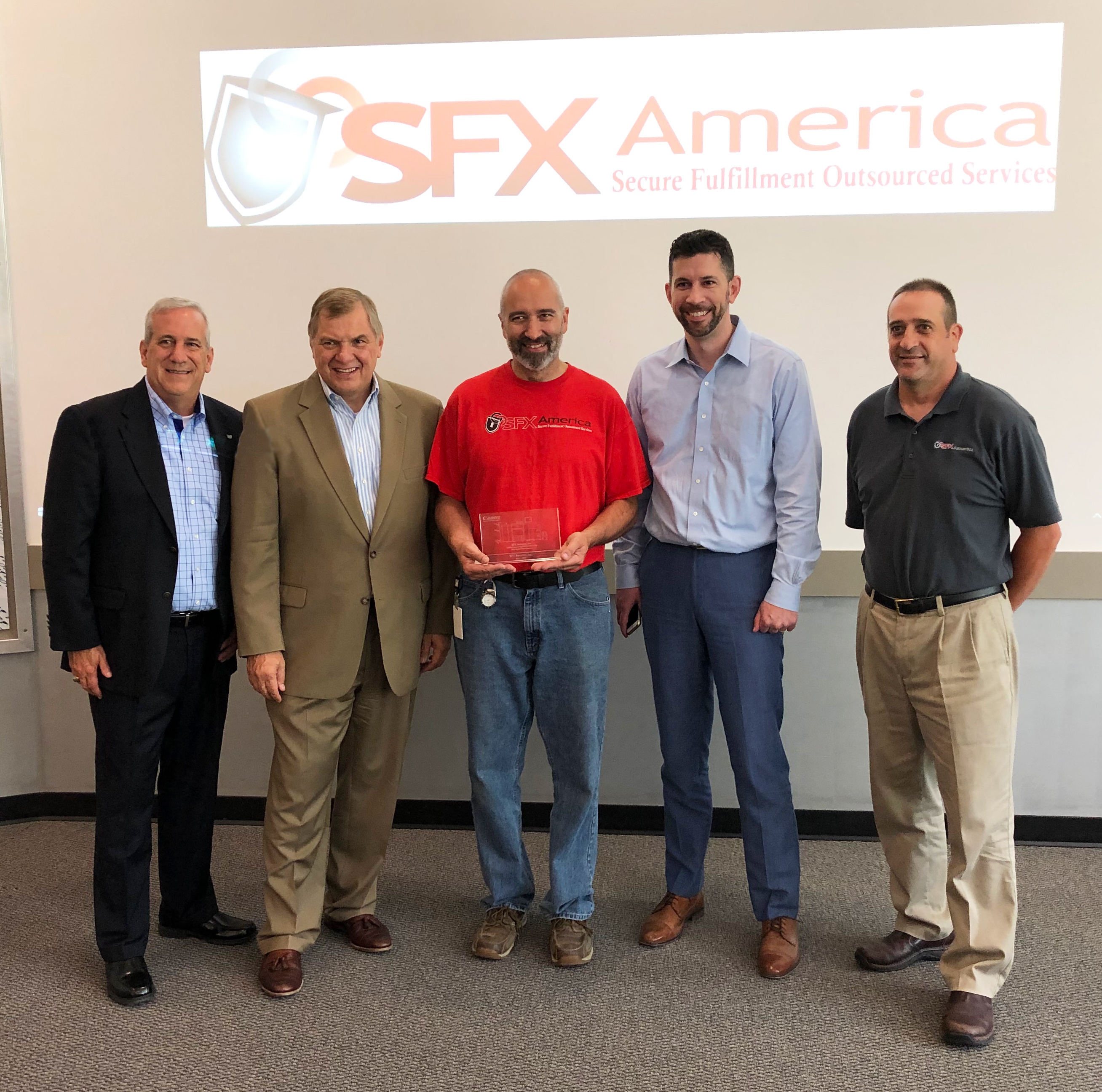 Canon Solutions America President, Peter Kowalczuk, presented SFX America with a plaque to commemorate the milestone of the 5000th imagePRESS installation.