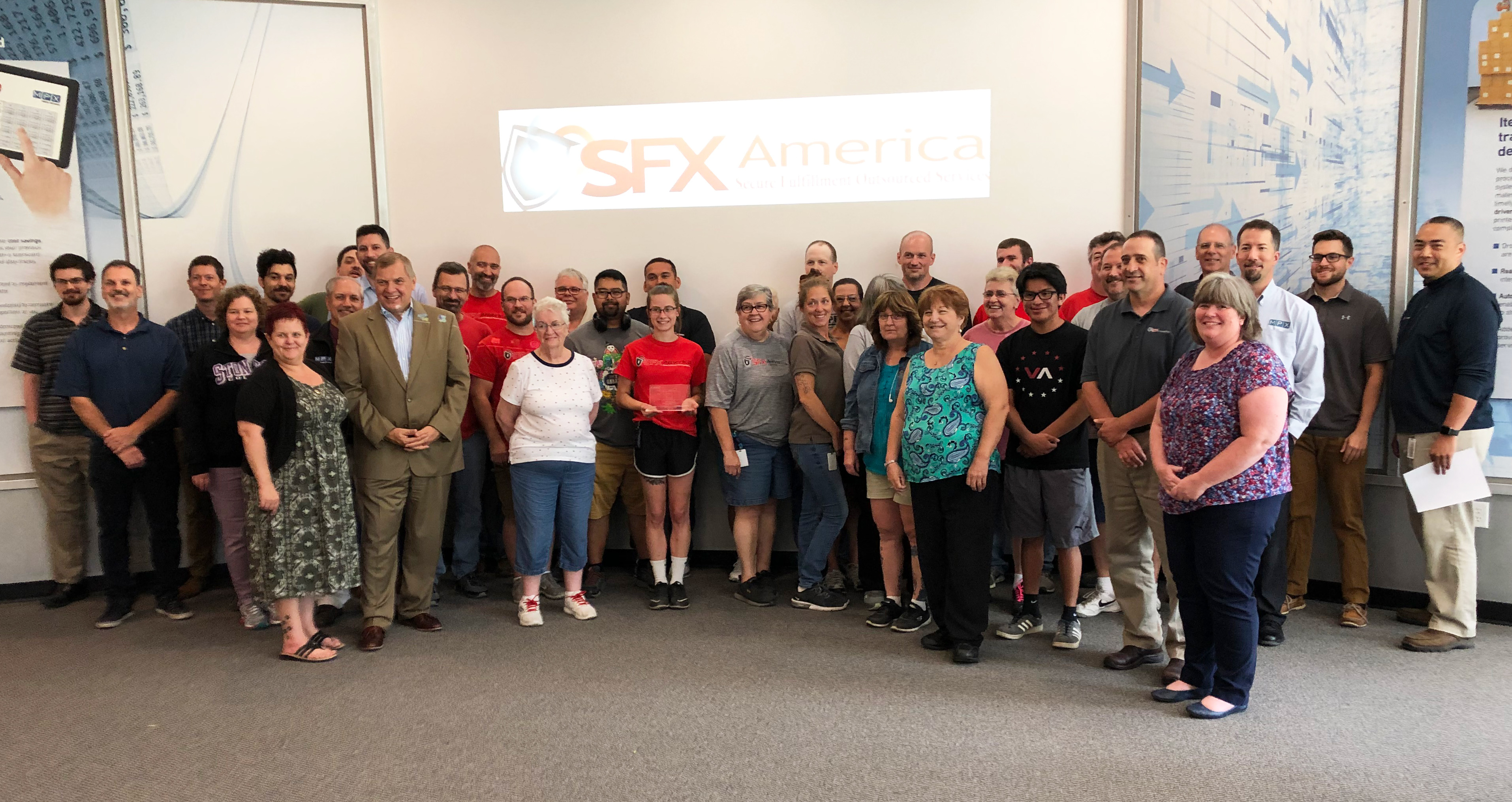 Peter Kowalczuk, President of Canon Solutions America, and the SFX team.