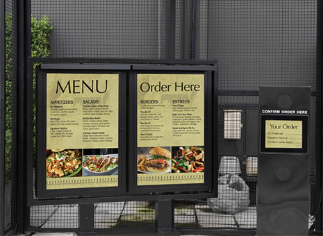 Image of menu boards at a fast food order line